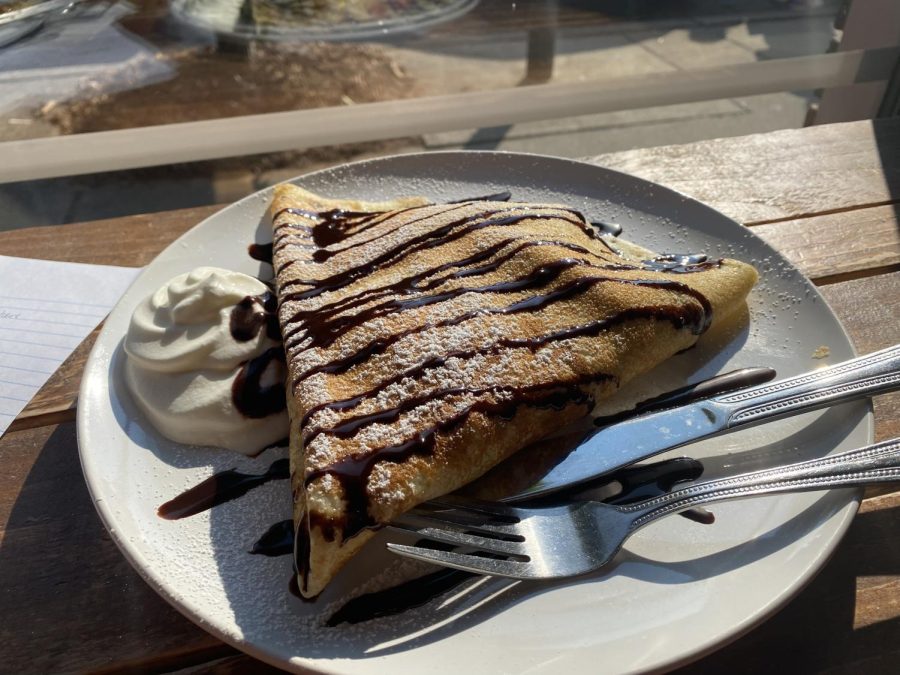 Camille is trying Exchange Coffee Co.s Strawberry and Nutella crepe for the first time.