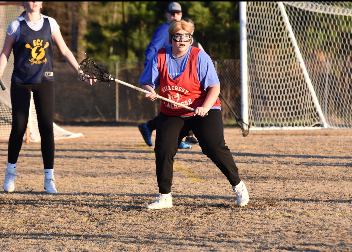 Anna Montjoy playing lacrosse.